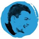 side profile of teenage boy laughing with blue paint decal overlay